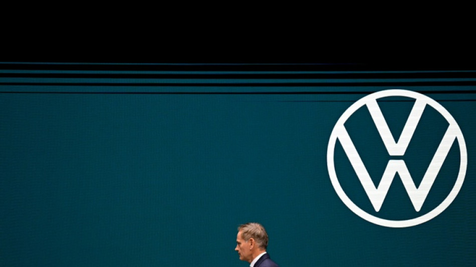 Volkswagen posts 1-billion-euro loss on tariffs, Porsche woes