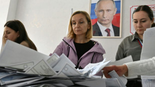 Putin's party set to retain power after Russia vote hit by cyberattacks, drones