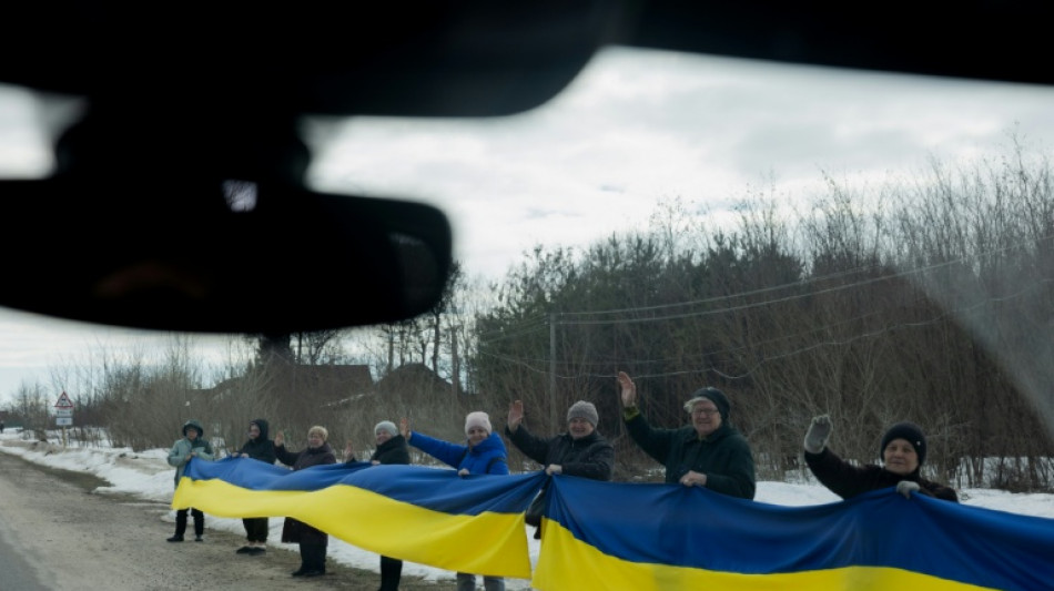 'We will wait for each one': Ukrainians greet POWs with tears and cheers