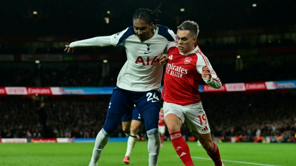 Arsenal aim to banish title jitters in Spurs showdown