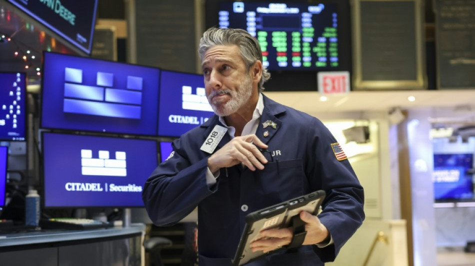 Wall Street termine en hausse, satisfaite par la Fed