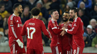 Liverpool tame Wolves to reach FA Cup quarter-finals