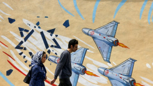 Iran says seized two ships seeking to cross Strait of Hormuz