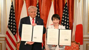 Stocks retreat after Wall Street surge